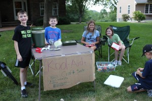 kids and money lemonade stand