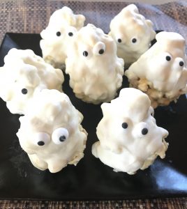Halloween Treats: Popcorn Ball Ghosts with Wilton Candy Eyes
